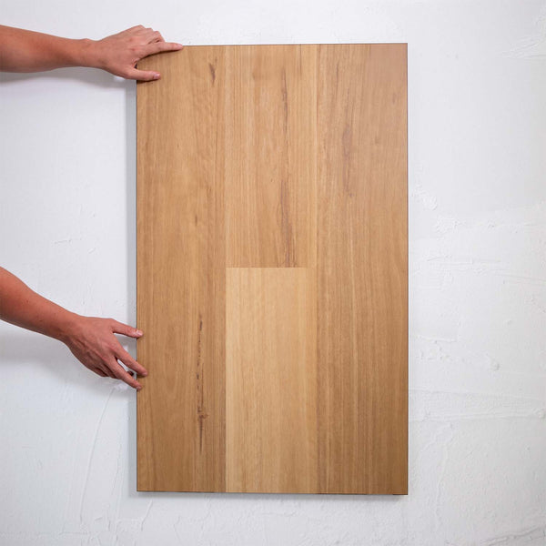 Flat lay of Coastal Blackbutt SPC Hybrid Floorboards 5+1.5mm in Coastal Blackbutt colour dark shade hybrid flooring sample