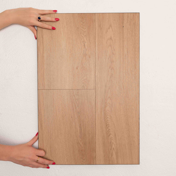 Flat lay of Coastal Spotted Gum Sterling Vinyl Plank 1220x229x3mm in Coastal Spotted colour warm tone vinyl flooring plank sample