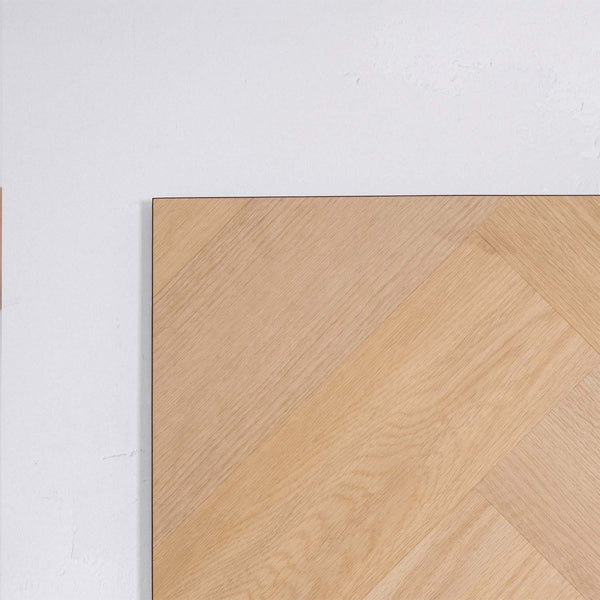 Profile view of French Oak SPC Hybrid Floorboards Herringbone 7.5+2mm in French Oak colour warm tone herringbone flooring sample