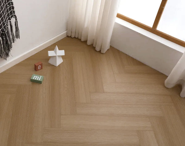 Detailed view of French Oak SPC Hybrid Floorboards Herringbone 7.5+2mm in French Oak colour warm tone herringbone flooring sample