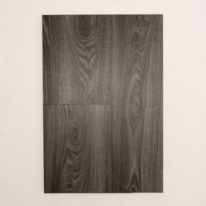 Flat lay of Midnight Oak Vision Vinyl 5mm in Midnight Oak colour dark shade vinyl flooring plank sample