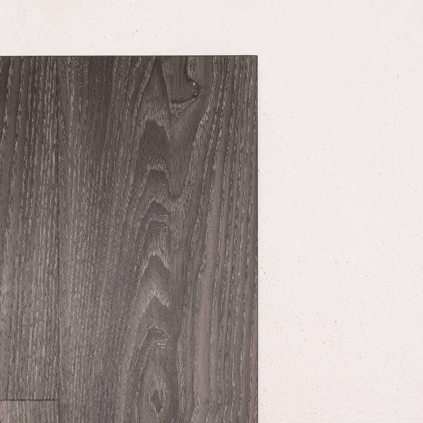Angled view of Midnight Oak Vision Vinyl 5mm in Midnight Oak colour dark shade vinyl flooring plank sample