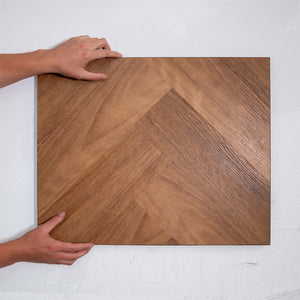 Top-down view of Pacific Spotted Gum SPC Hybrid Floorboards Herringbone 7.5+2mm in Pacific Spotted colour warm tone herringbone flooring sample