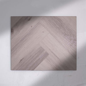 Full view of Snow Grey SPC Hybrid Floorboards Herringbone 7.5+2mm in Snow Grey colour light tone herringbone flooring sample