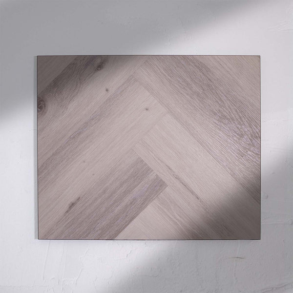 Full view of Snow Grey SPC Hybrid Floorboards Herringbone 7.5+2mm in Snow Grey colour light tone herringbone flooring sample