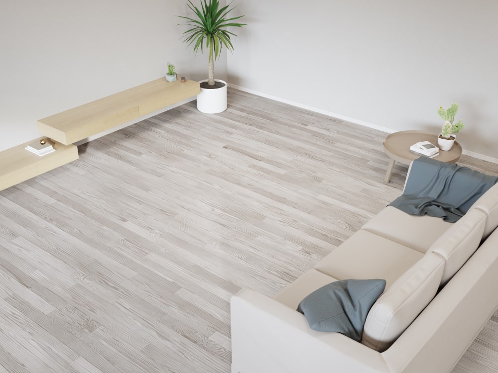 light room with neutral toned flooring and furniture.