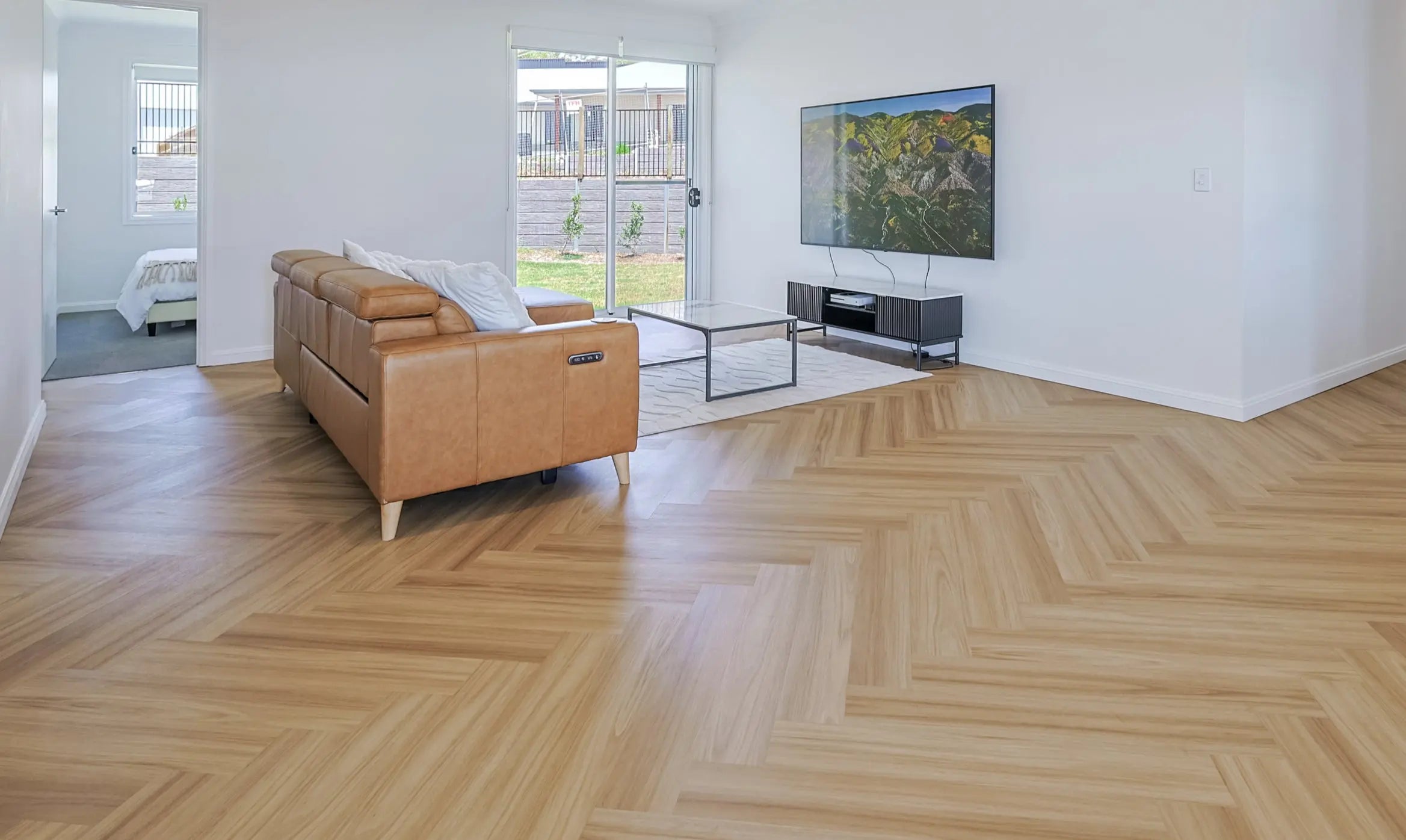 Sandlight herringbone luxury vinyl plank flooring room scene