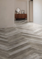 Grey River Pine herringbone luxury vinyl plank flooring room scene