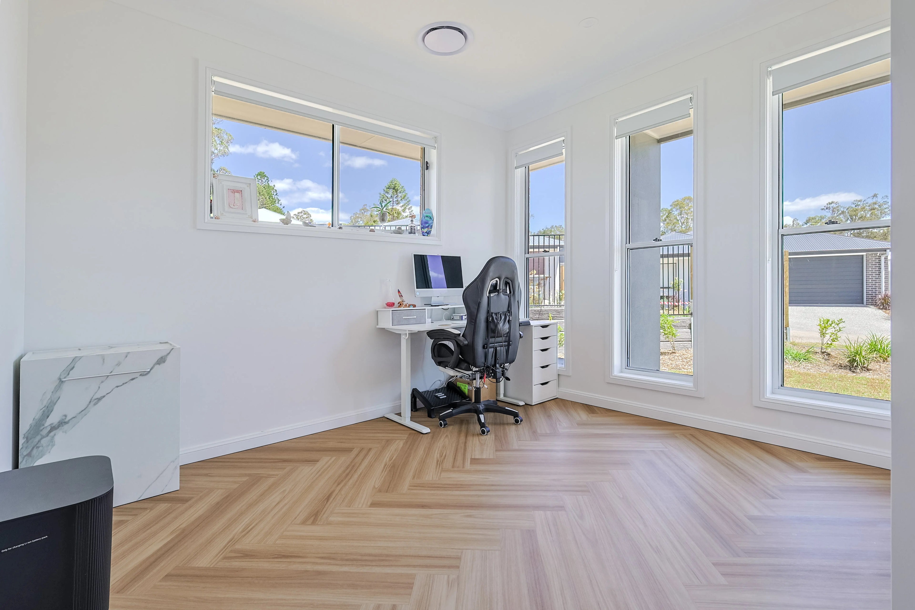 Sandlight herringbone luxury vinyl plank flooring room scene