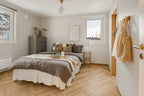 Honeycomb Ash herringbone luxury vinyl plank flooring room scene