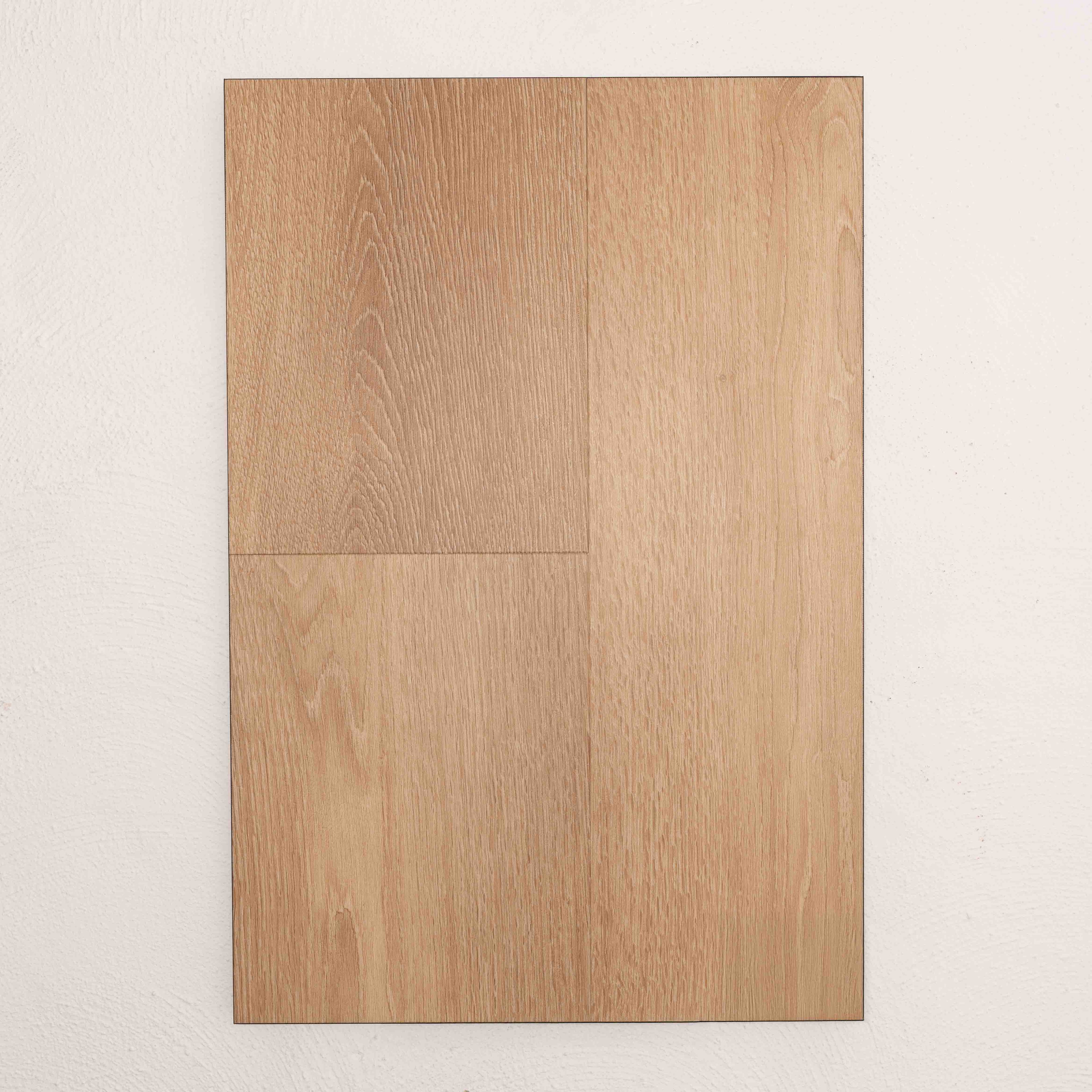 Flat lay of Autumn Oak Vision Vinyl Planks 5mm in Autumn Oak colour warm tone vinyl flooring plank sample