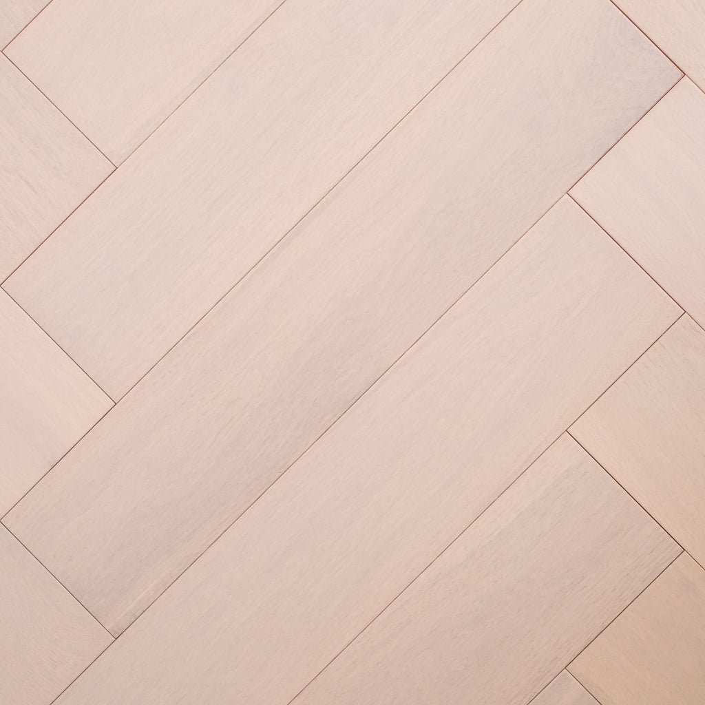 Top-down view of Casper White Engineered Timber Herringbone 15.3mm in Casper White colour light tone herringbone flooring sample