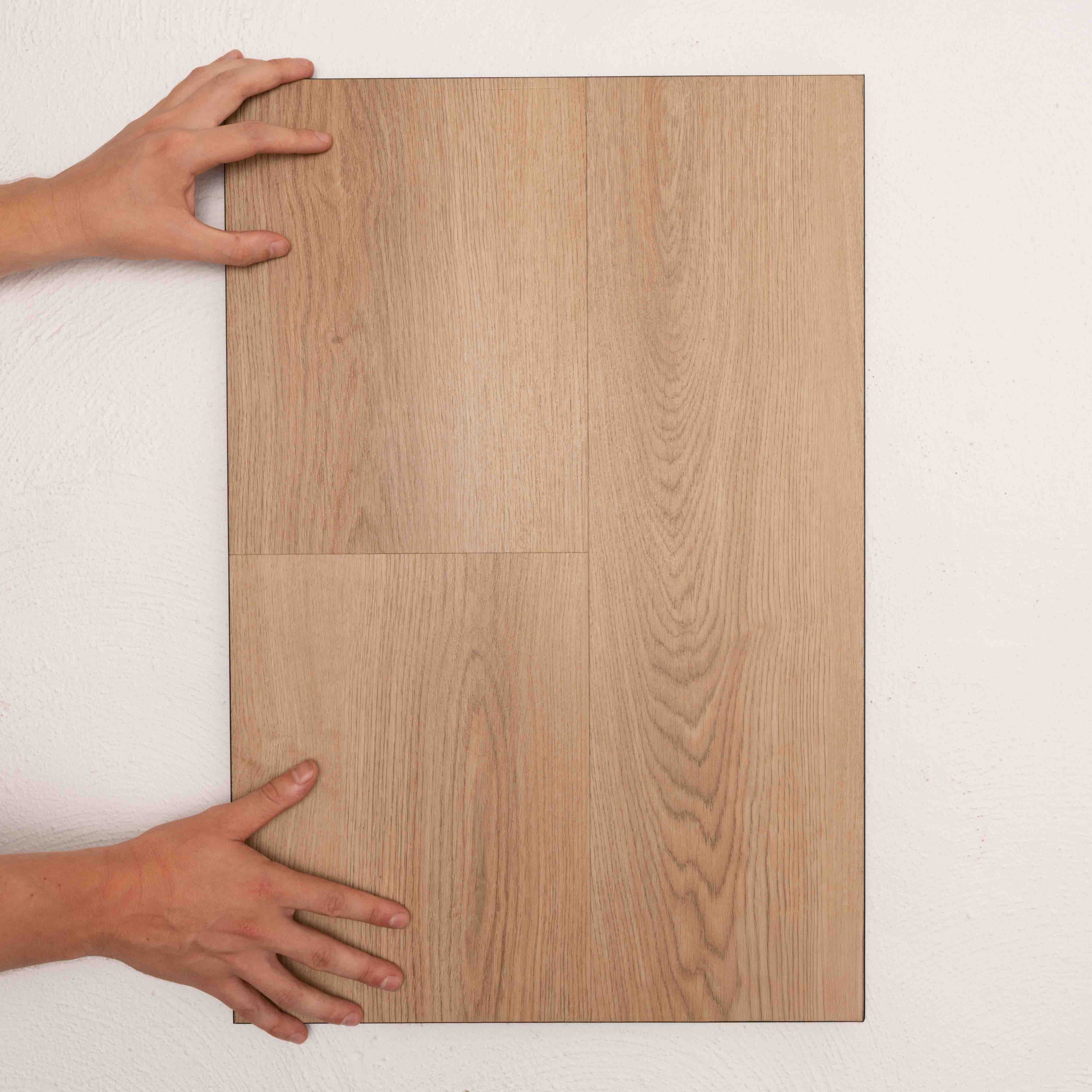 Angled view of Chestnut Oak Allure Vinyl Plank 1423x229x4.5mm in Chestnut Oak colour warm tone vinyl flooring plank sample