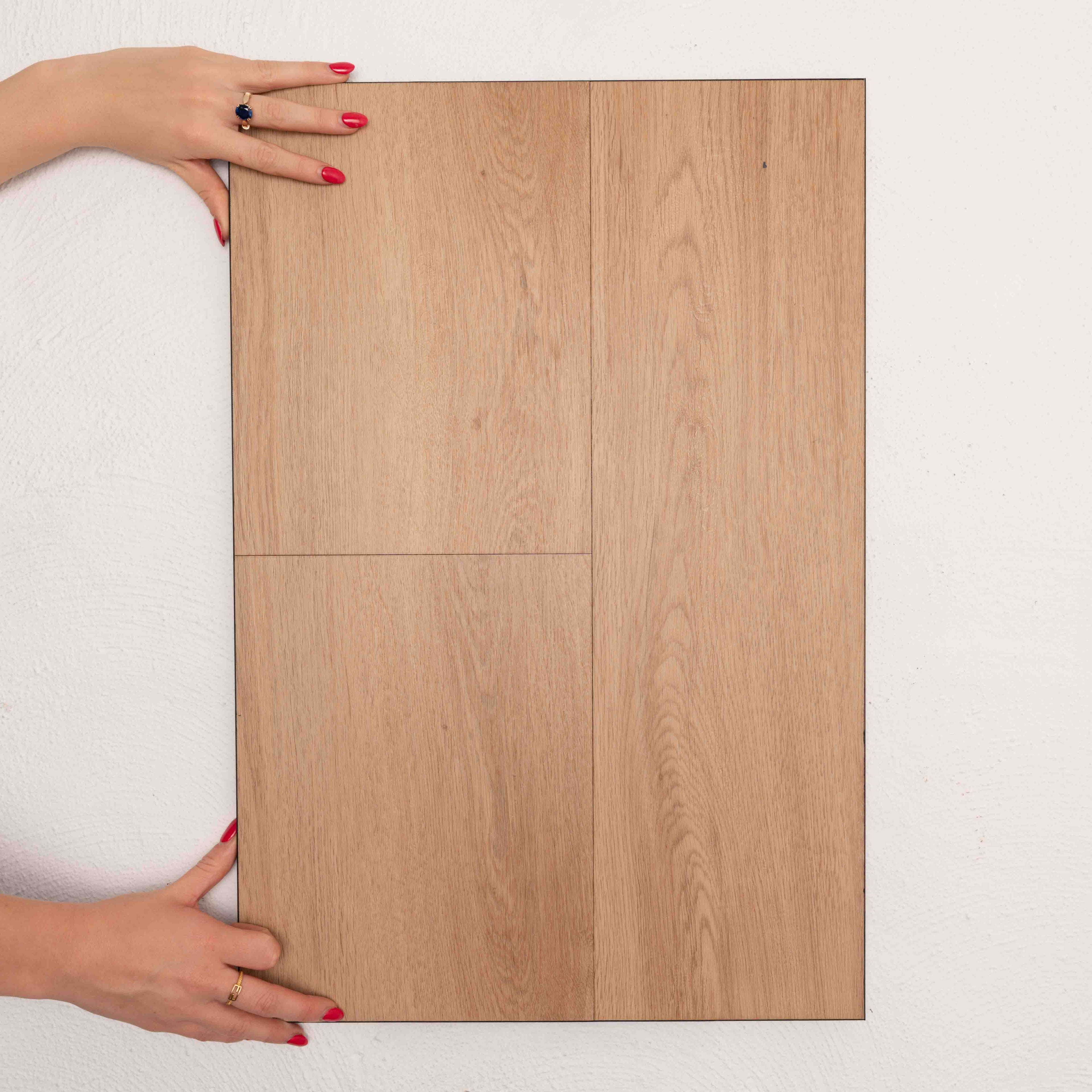 Flat lay of Coastal Spotted Gum Sterling Vinyl Plank 1220x229x3mm in Coastal Spotted colour warm tone vinyl flooring plank sample