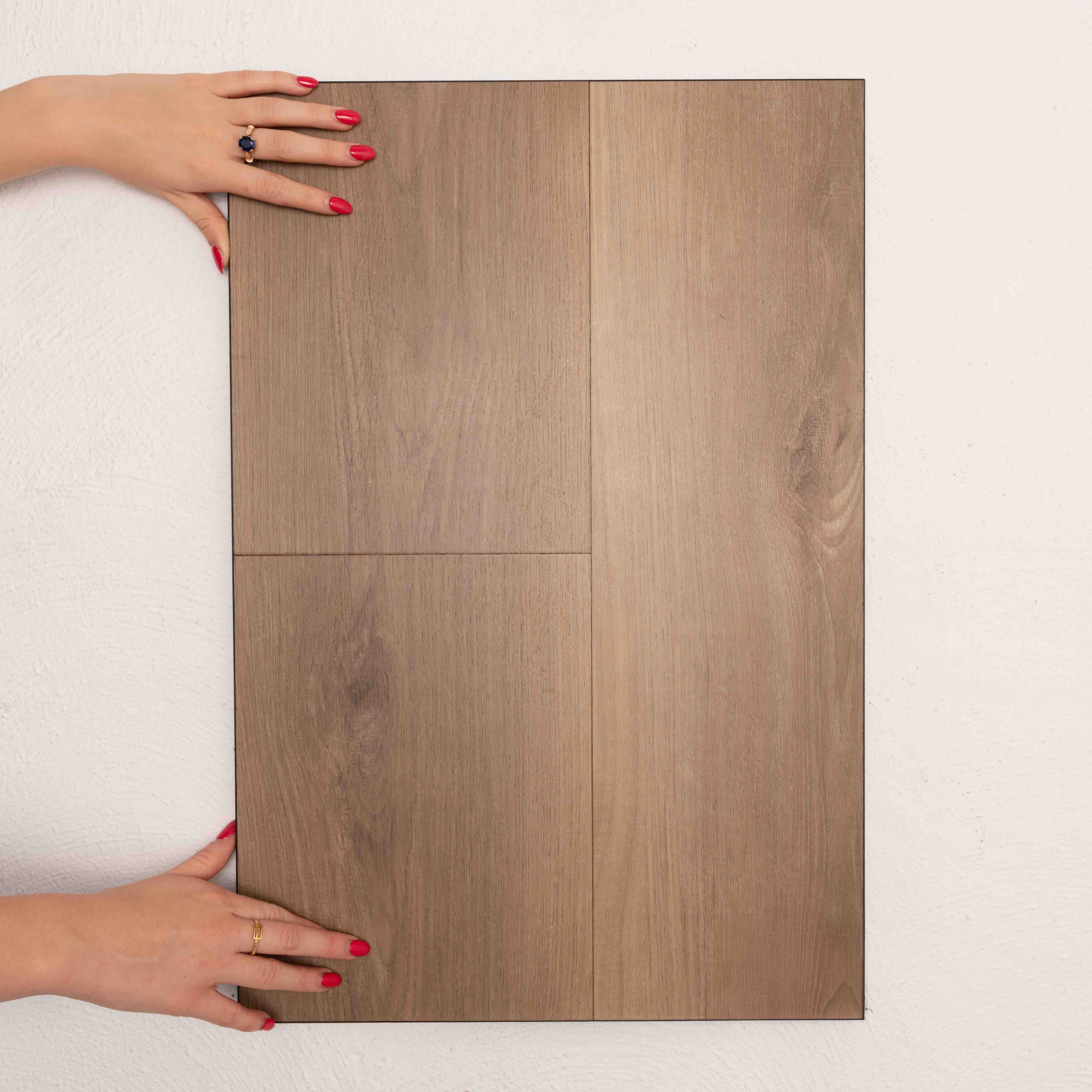 Side view of Grand Oak Sterling Vinyl Plank 1220x229x3mm in Grand Oak colour warm tone vinyl flooring plank sample