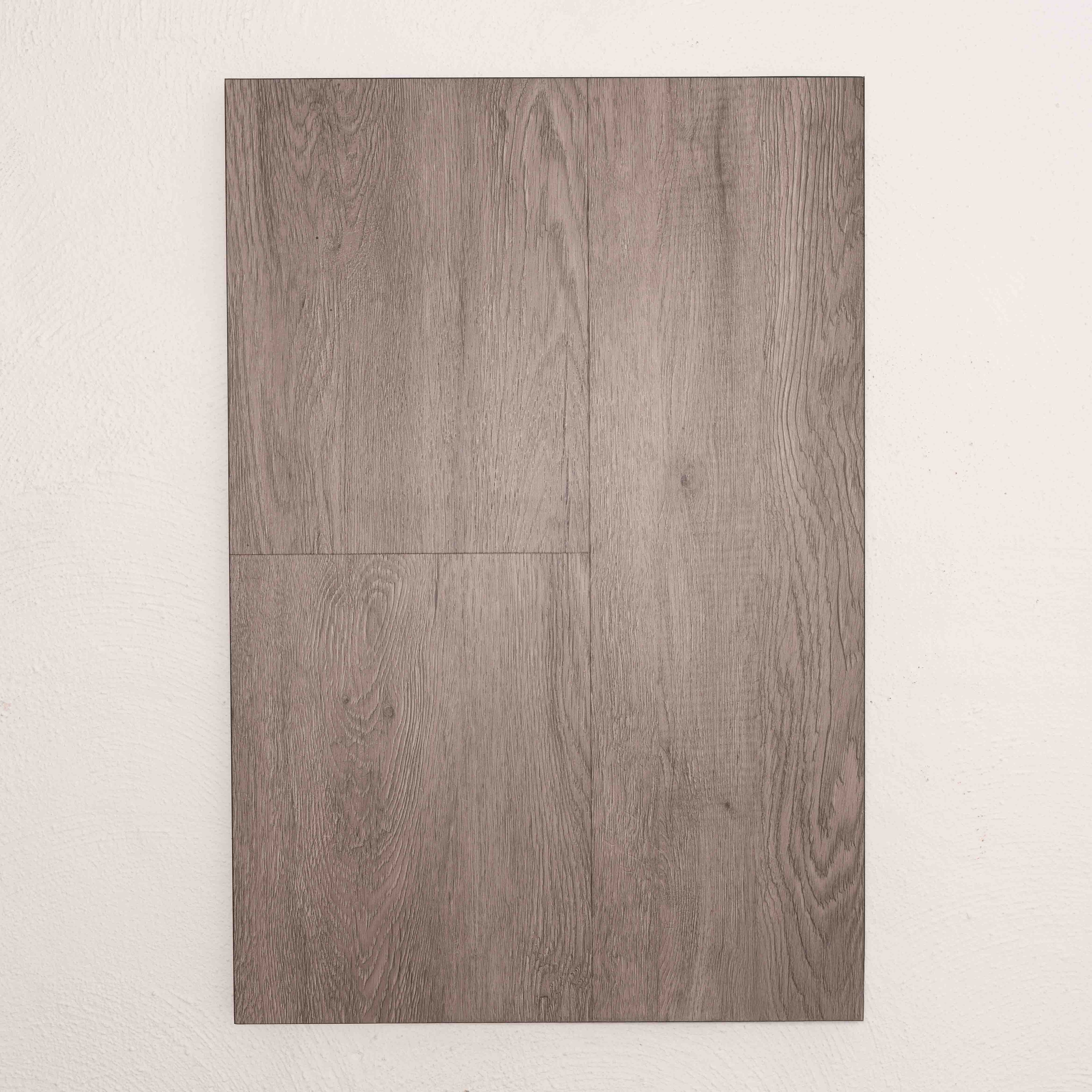Angled view of Grey Wash Oak Vision Vinyl 5mm in Grey Wash colour neutral tone vinyl flooring plank sample