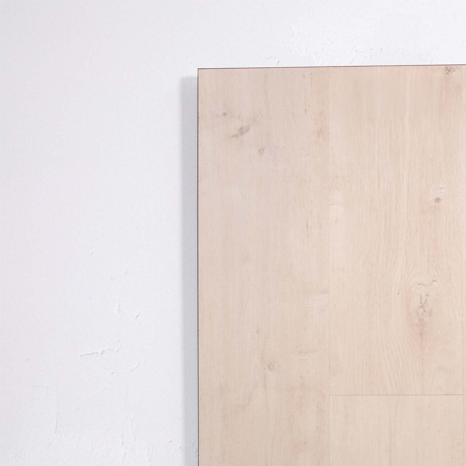 Angled view of Ivory Beige SPC Hybrid Floorboards 5+1.5mm in Ivory Beige colour warm tone hybrid flooring sample