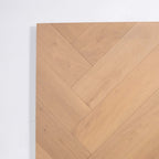 Detailed view of Light Malt Engineered Timber Herringbone 15.3mm in Light Malt colour light tone herringbone flooring sample