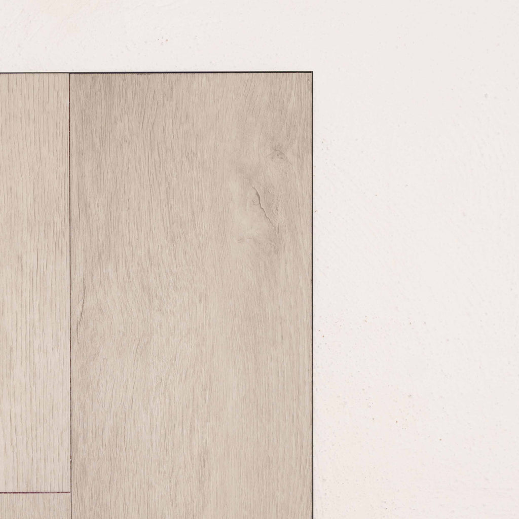 Angled view of Light Grey Oak Sterling Vinyl Plank 1220x229x3mm in Light Grey colour light tone vinyl flooring plank sample