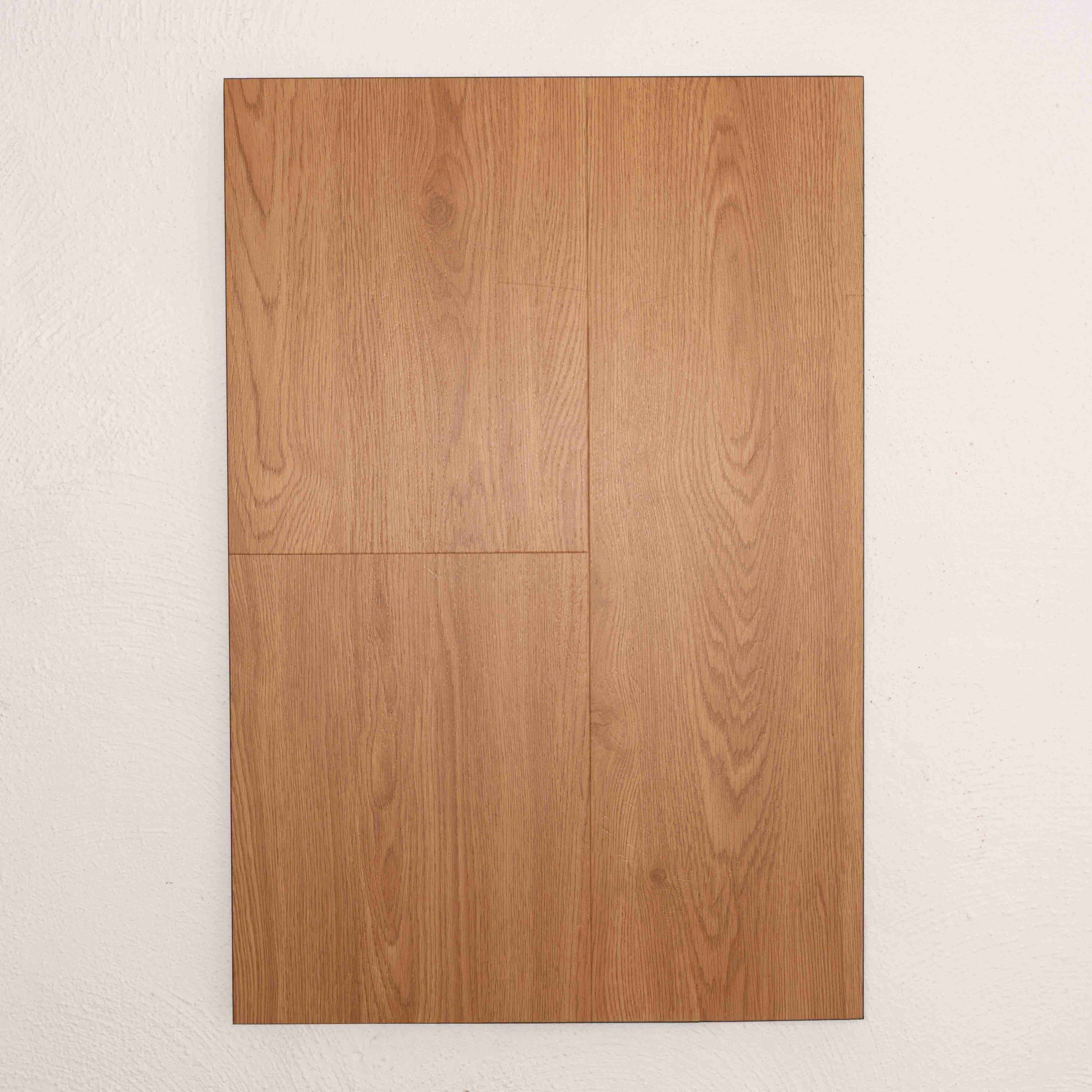 Flat lay of Manila Oak Vision Vinyl 5mm in Manila Oak colour warm tone vinyl flooring plank sample