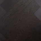 Top-down view of Midnight Grey Engineered Timber Herringbone 15.3mm in Midnight Grey colour dark shade herringbone flooring sample