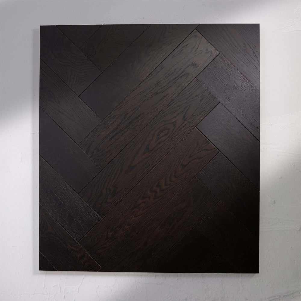 Detailed view of Midnight Grey Engineered Timber Herringbone 15.3mm in Midnight Grey colour dark shade herringbone flooring sample