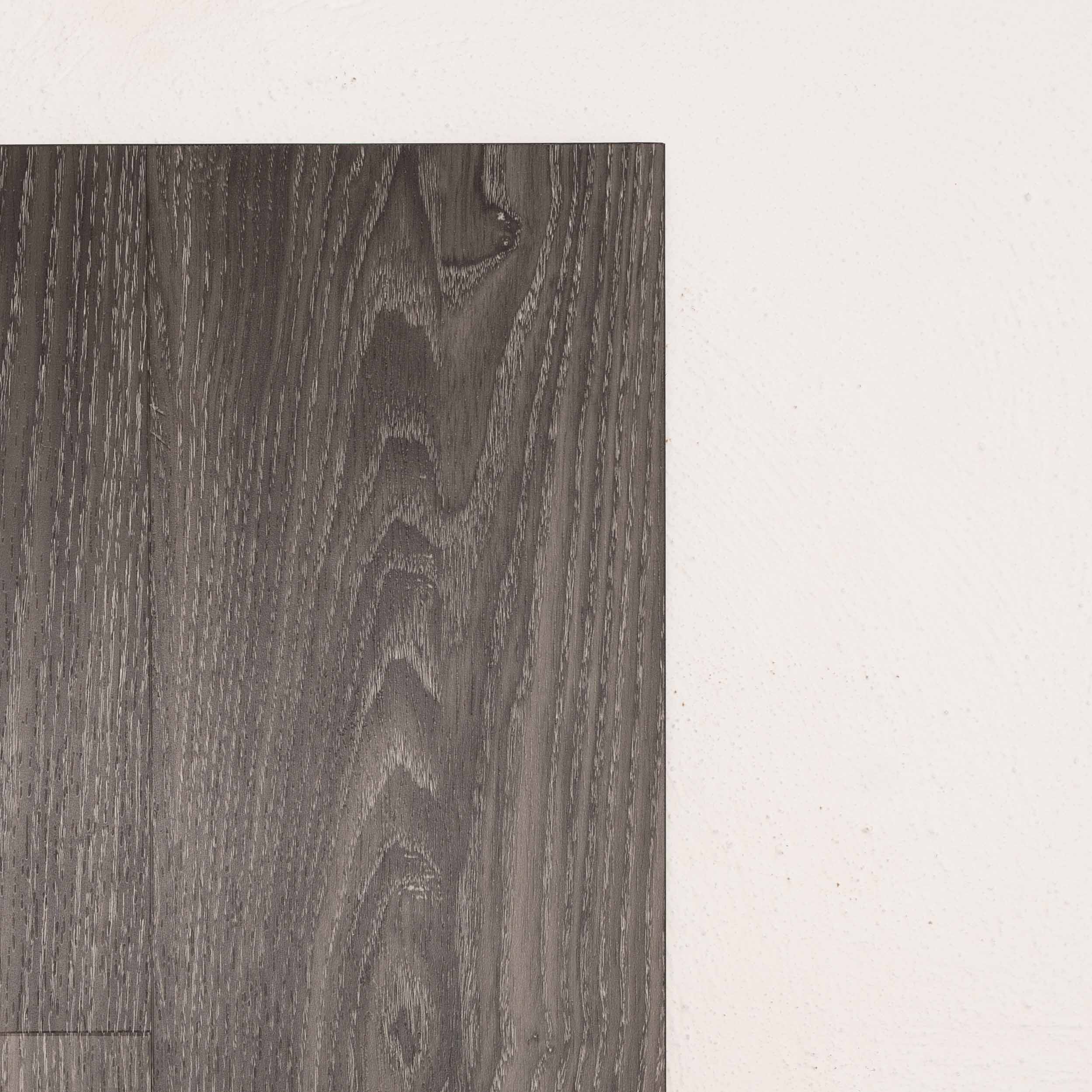 Angled view of Midnight Oak Vision Vinyl 5mm in Midnight Oak colour dark shade vinyl flooring plank sample