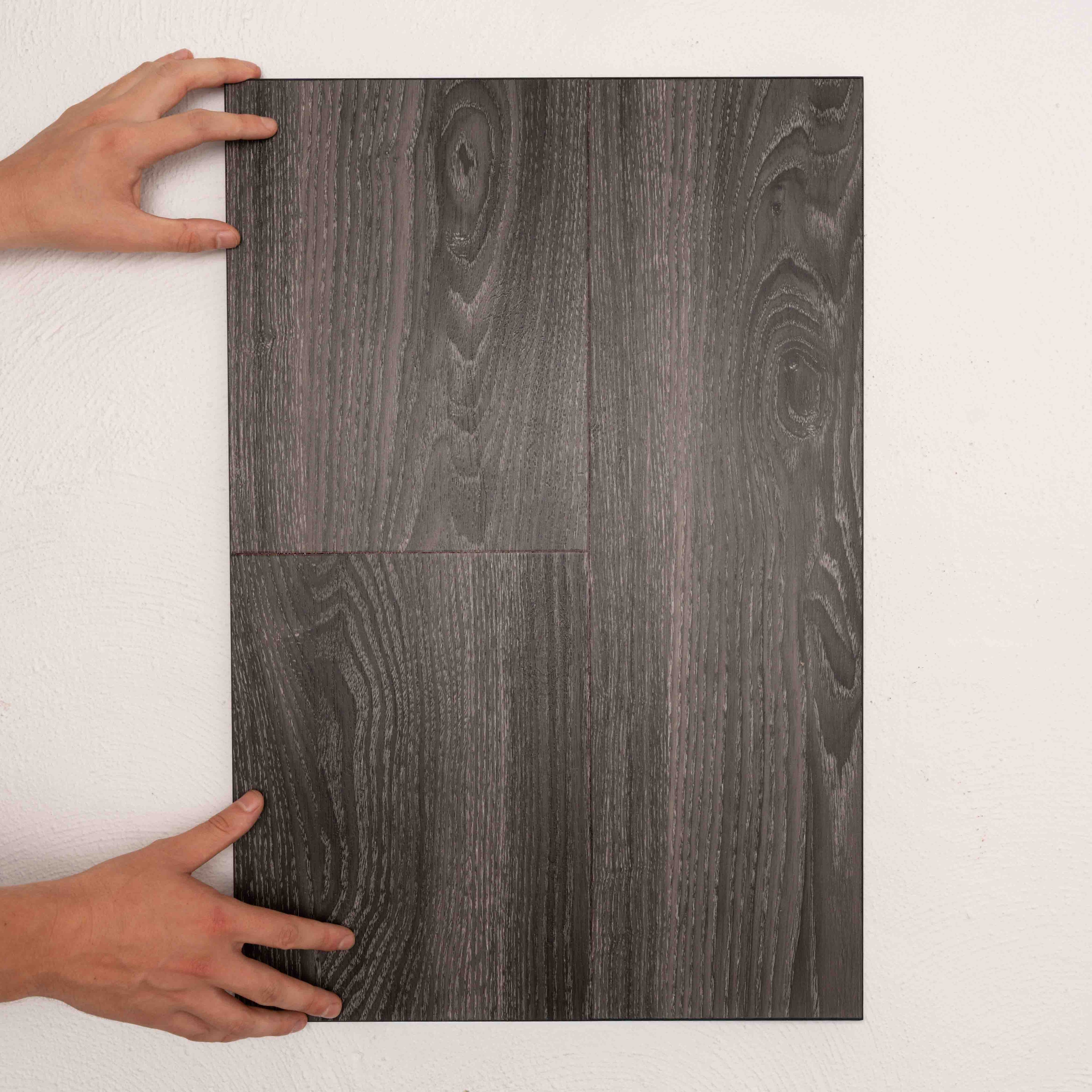 Front view of Midnight Oak Sterling Vinyl Plank 1220x229x3mm in Midnight Oak colour dark shade vinyl flooring plank sample