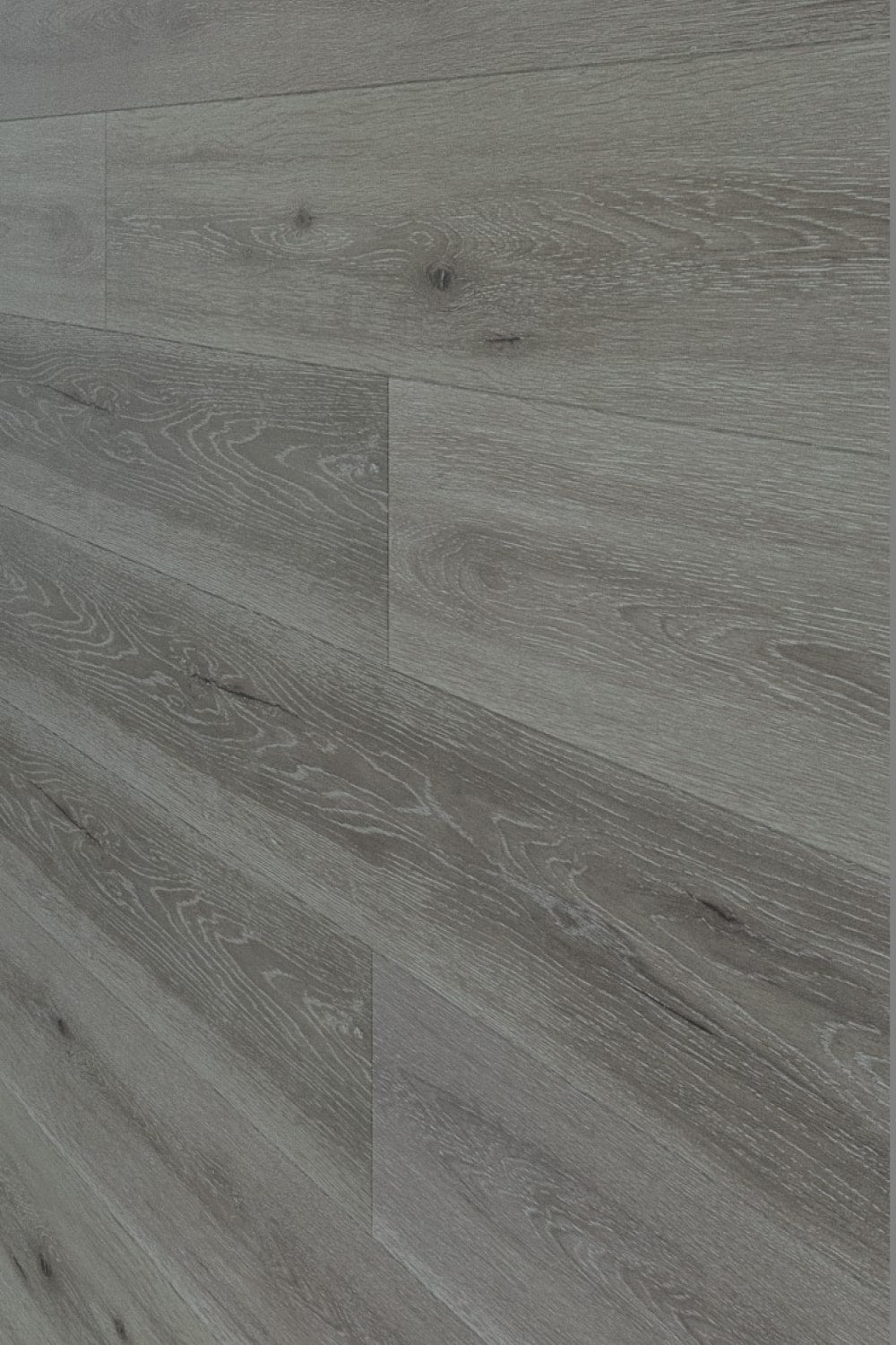 Close-up of Mystic Grey Urban Laminate Floors 12mm in Mystic Grey colour neutral tone flooring sample