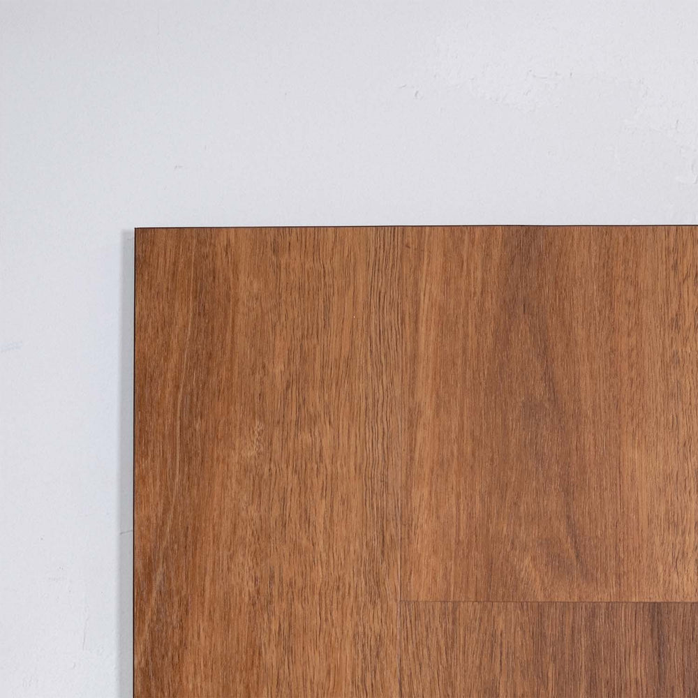 Angled view of Pacific Spotted Gum SPC Hybrid Floorboards 7.5+2mm in Pacific Spotted colour warm tone hybrid flooring sample