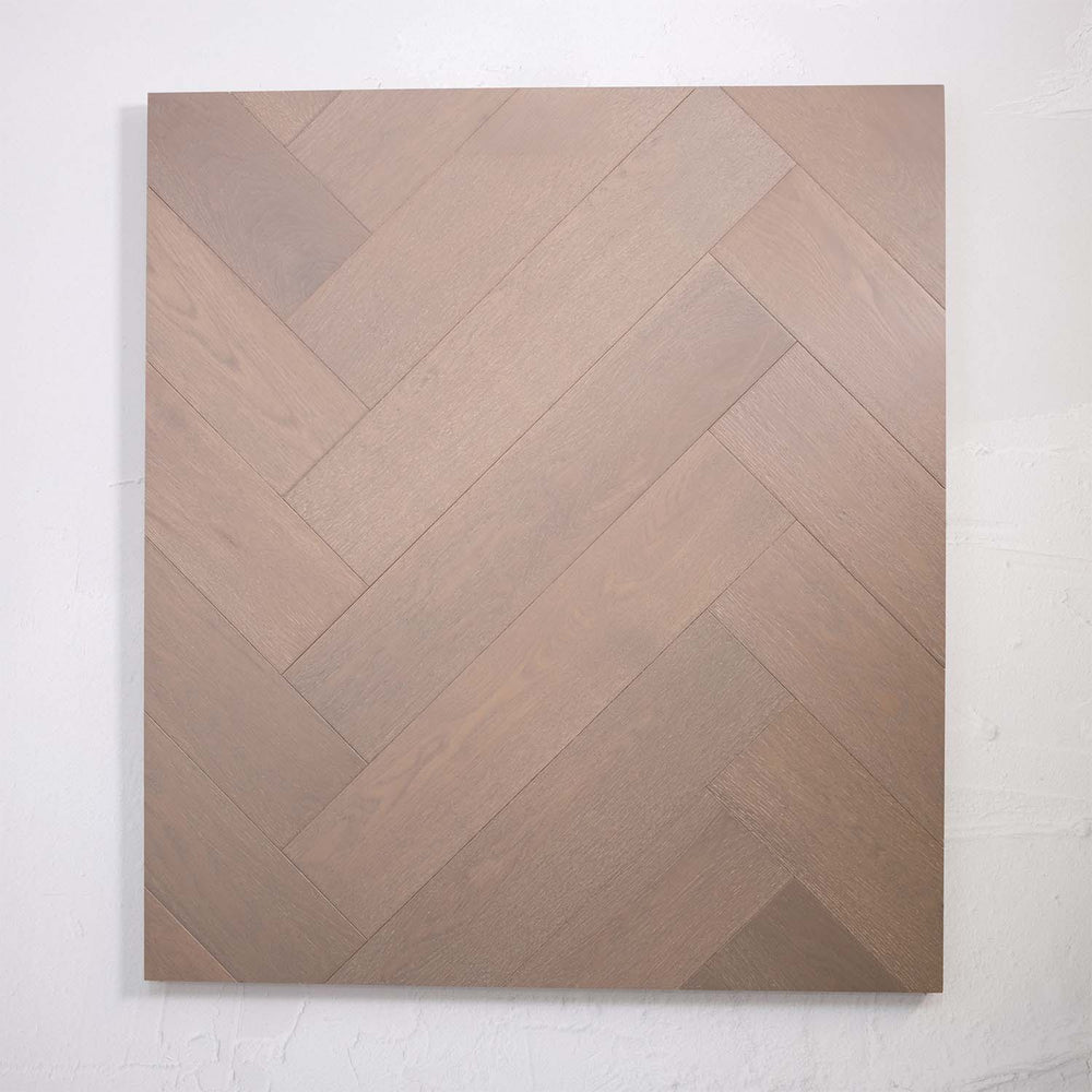 Perspective view of Pale Oak Engineered Timber Herringbone 15.3mm in Pale Oak colour warm tone herringbone flooring sample