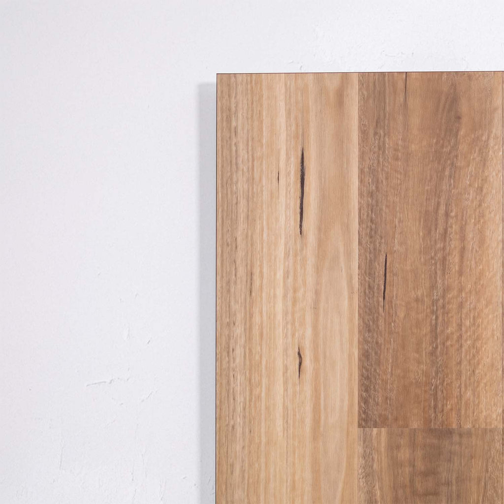 Side view of QLD Spotted Gum Hybrid Flooring 6.5mm in QLD Spotted colour warm tone hybrid flooring sample