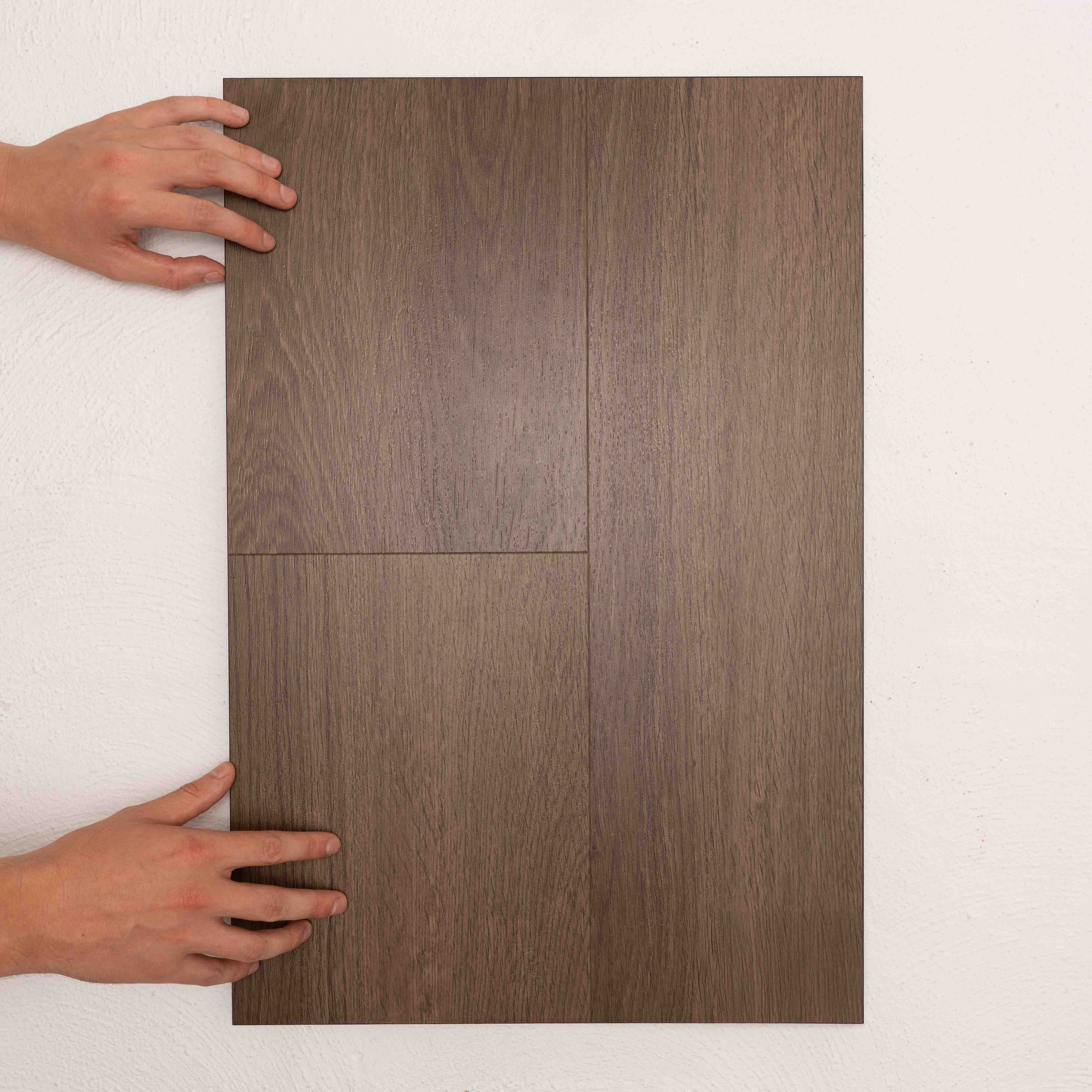 Close-up of Saddle Oak Vision Vinyl Planks 5mm in Saddle Oak colour warm tone vinyl flooring plank sample