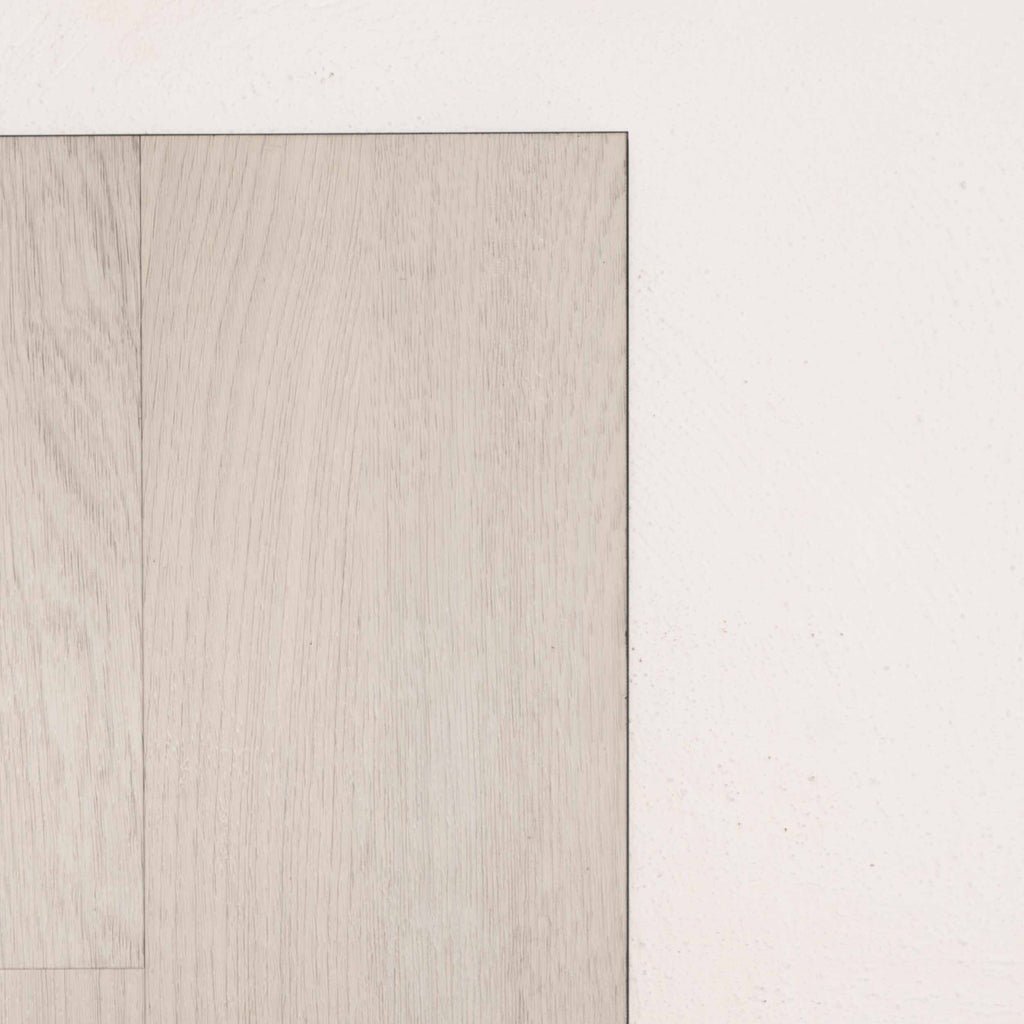 Side view of Silver White Allure Vinyl Plank 1423x229x4.5mm in Silver White colour light tone vinyl flooring plank sample