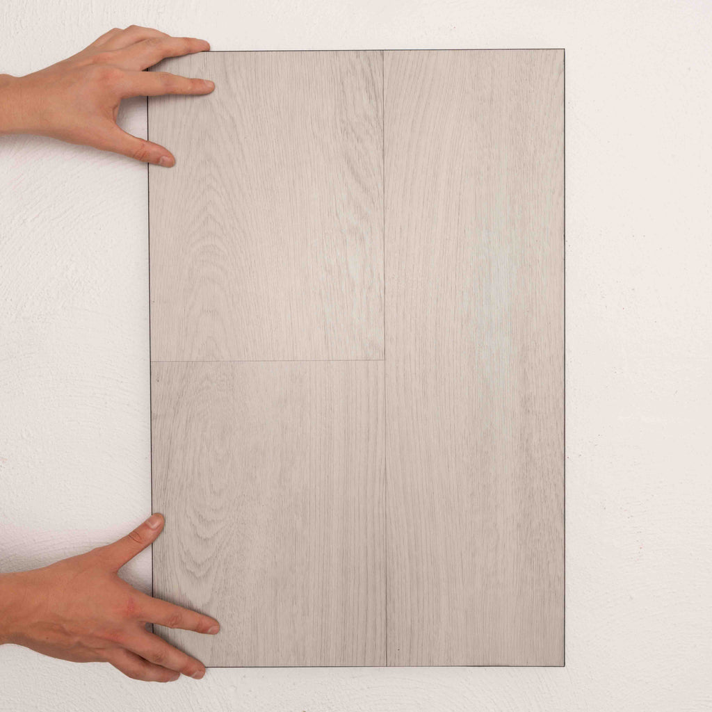 Top-down view of Silver White Allure Vinyl Plank 1423x229x4.5mm in Silver White colour light tone vinyl flooring plank sample