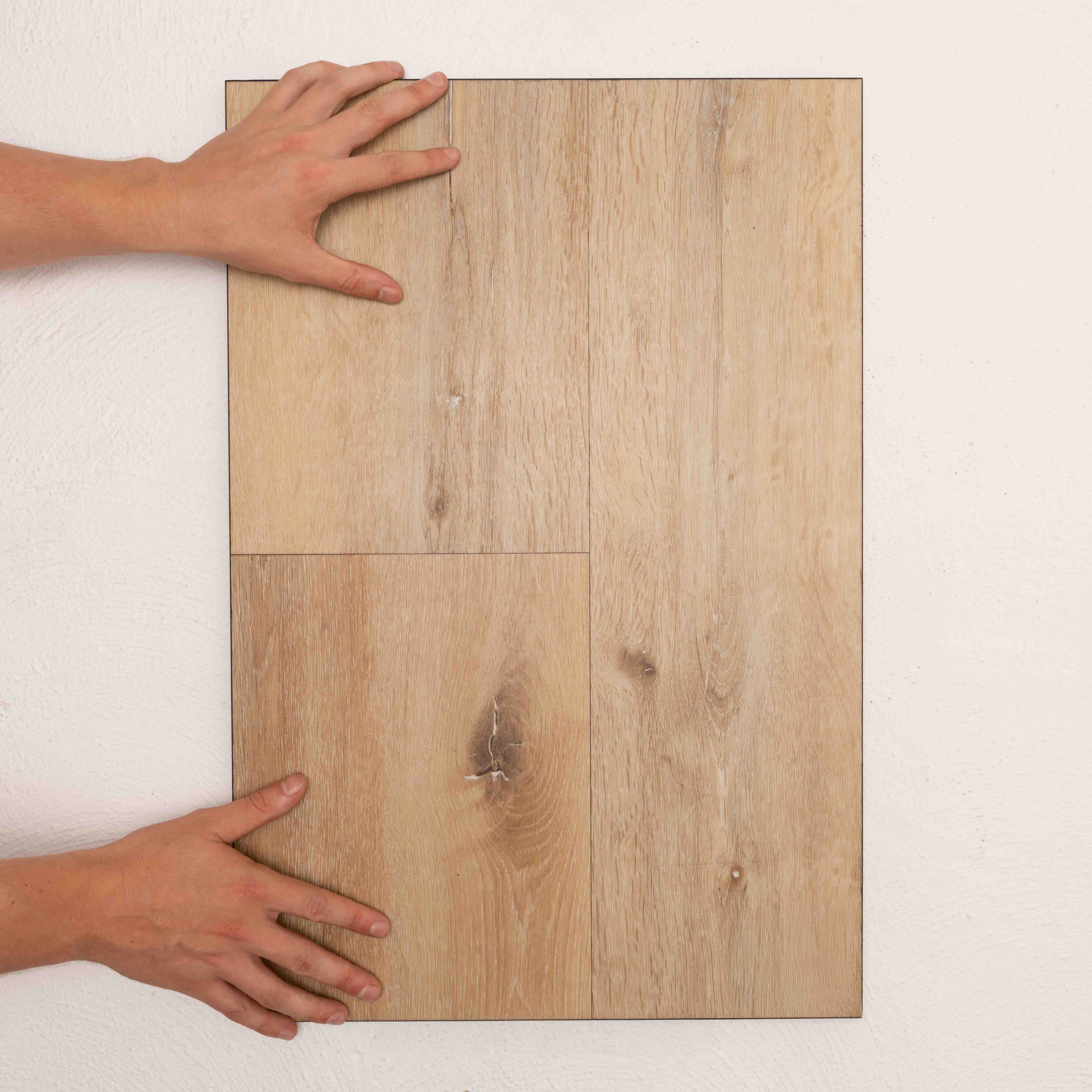 Top-down view of Smoulder Oak Sterling Vinyl Plank 1220x229x3mm in Smoulder Oak colour warm tone vinyl flooring plank sample