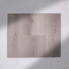 Side view of Snow Grey SPC Hybrid Floorboards 7.5+2mm in Snow Grey colour light tone hybrid flooring sample