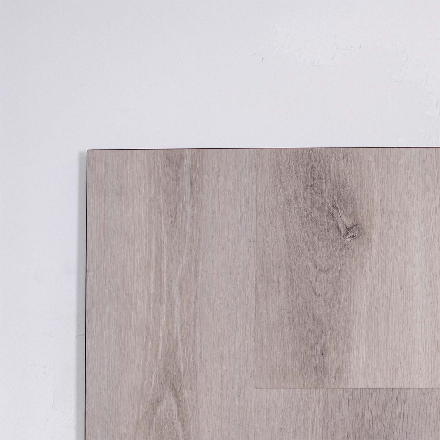 Perspective view of Snow Grey SPC Hybrid Floorboards 7.5+2mm in Snow Grey colour light tone hybrid flooring sample