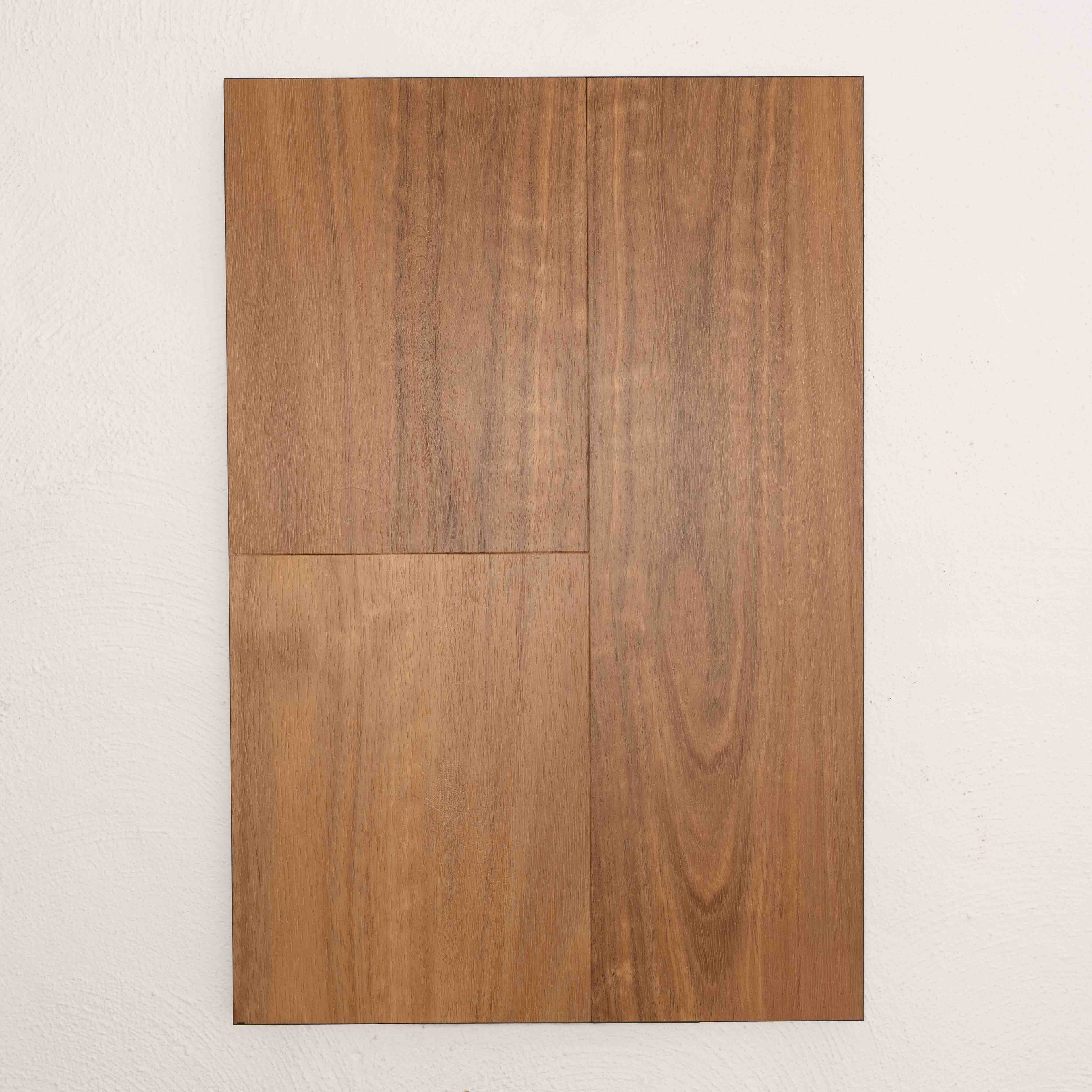 Angled view of Spotted Gum Vision Vinyl 5mm in Spotted Gum colour warm tone vinyl flooring plank sample