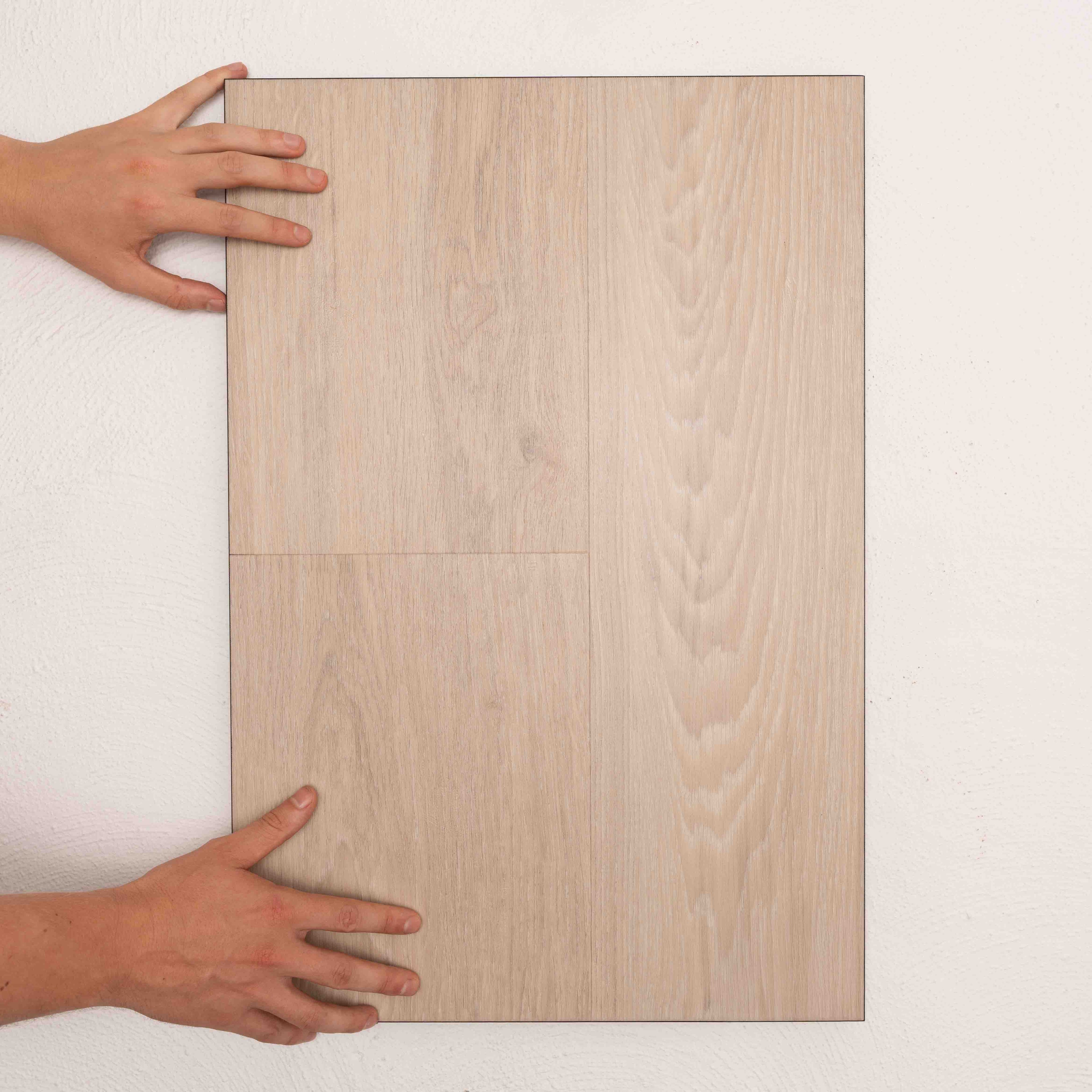 Top-down view of Urban Oak Vision Vinyl Planks 5mm in Urban Oak colour warm tone vinyl flooring plank sample