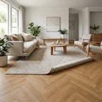 Sierra Oak herringbone vinyl flooring in a styled room