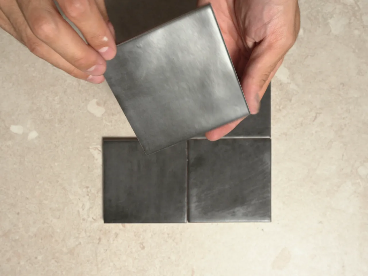 Chroma Black matte 100x100mm square wall tiles shown in a five-second video