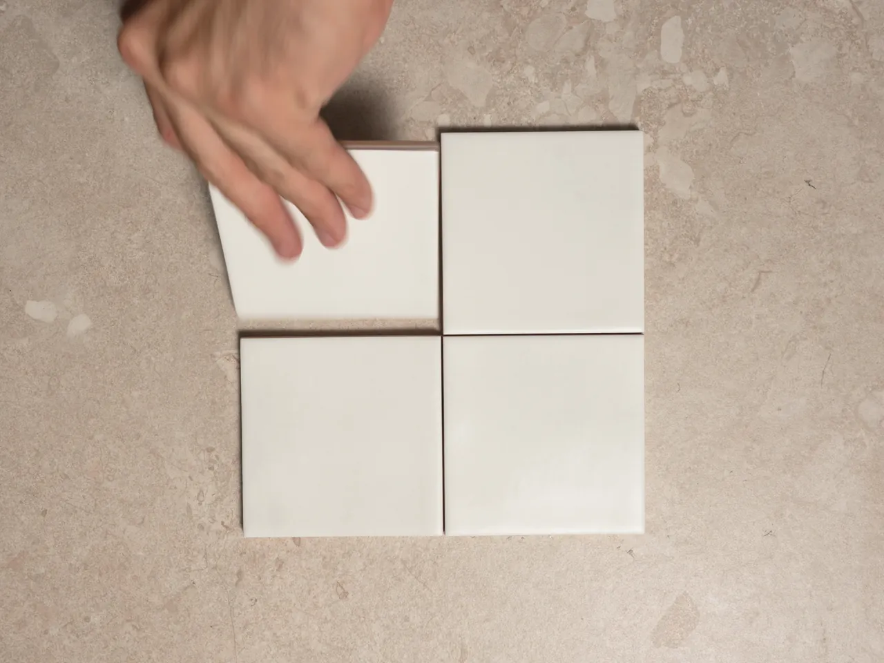 Chroma Pearl matte 100x100mm square wall tiles shown in a five-second video