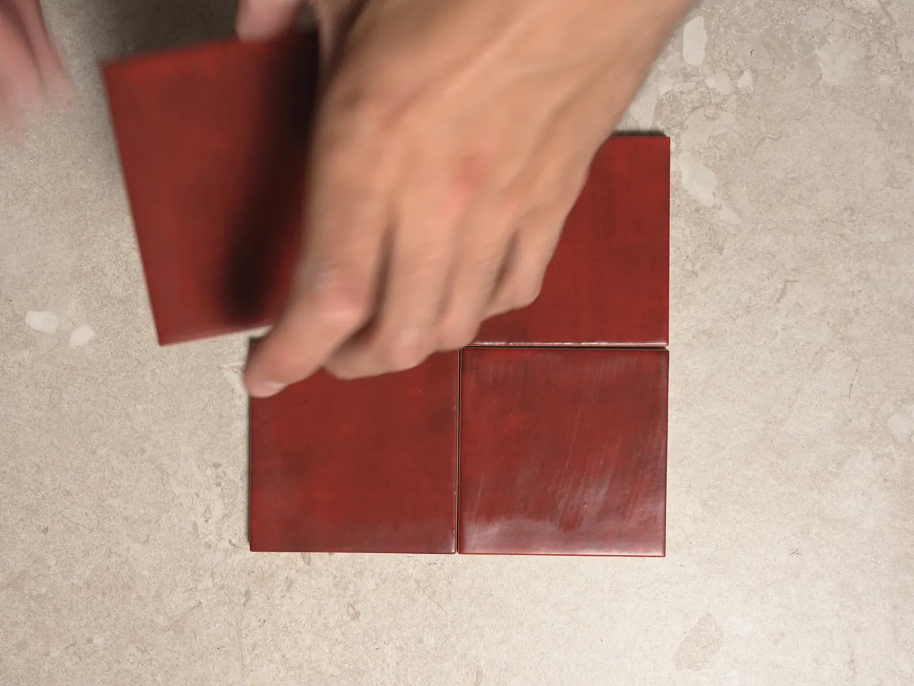 Chroma Rosso matte 100x100mm square wall tiles shown in a five-second video